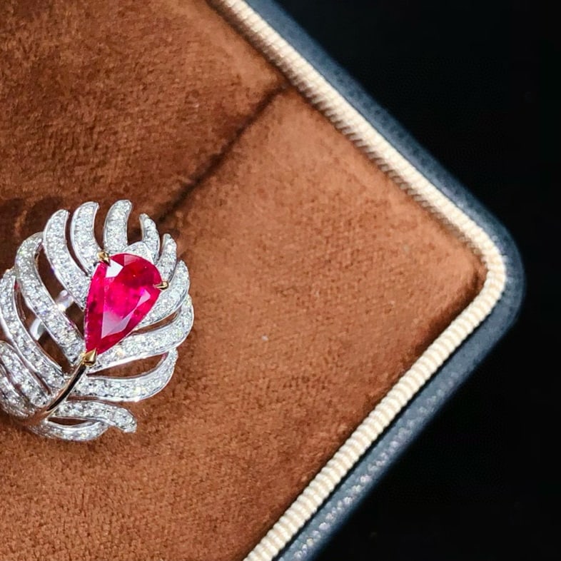 14k Gold 1.53 Ctw Natural Ruby & Diamond Ring: Ref:231088031 // gold content:14k gold // ring size:7. 25us // // main gemstone:ruby // shape:pear // carat weight:1. 02ct // color:pigeonblood red // treatment:natural // // adjacent gemstone 2 :
