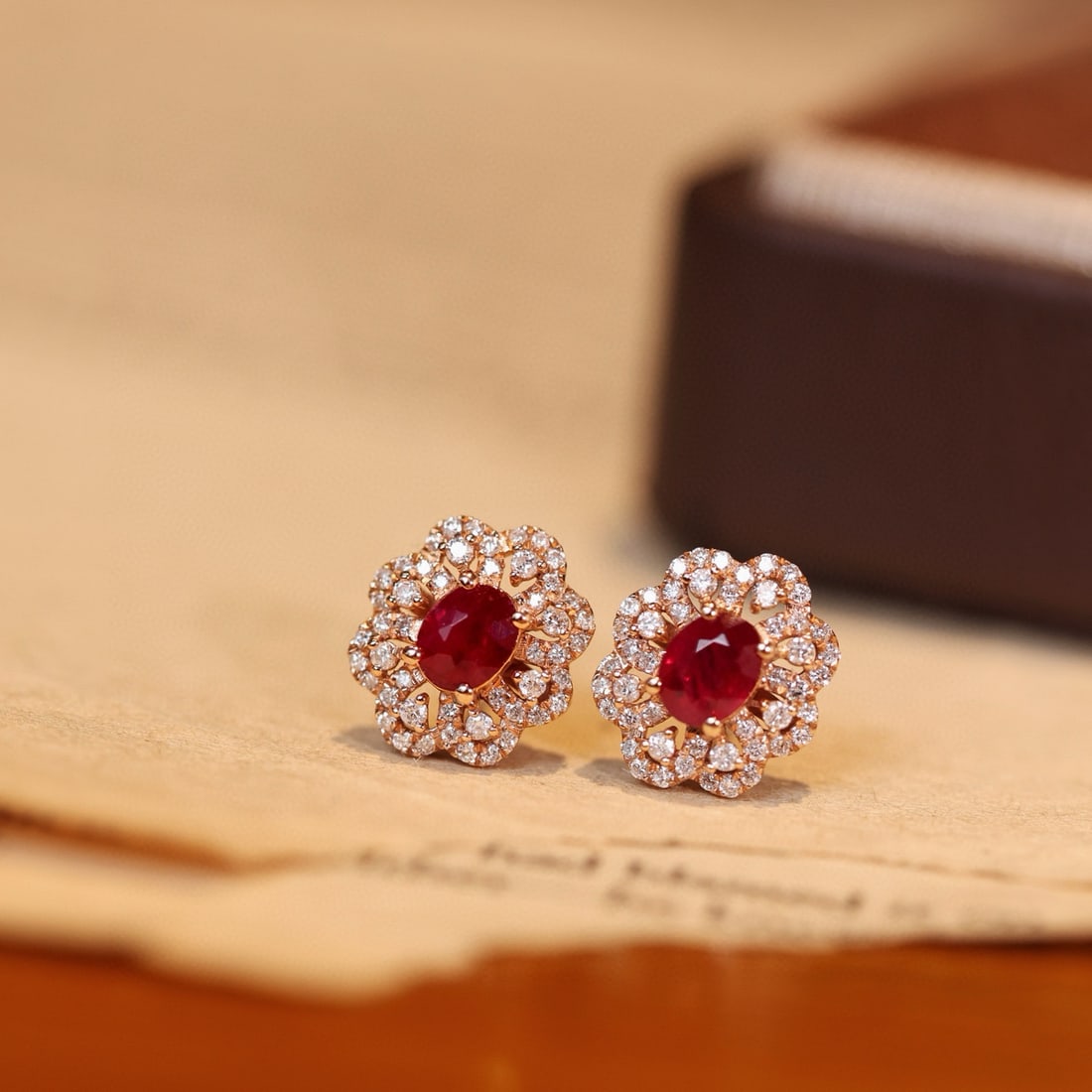 14k Gold 1.25 Ctw Natural Ruby & Diamond Earrings: Ref:231088033 // gold content:14k gold // main gemstone:ruby // shape:oval // carat weight:0. 8ct // color:pigeonblood red // treatment:natural // // adjacent gemstone 2 : diamond // shape:round //
