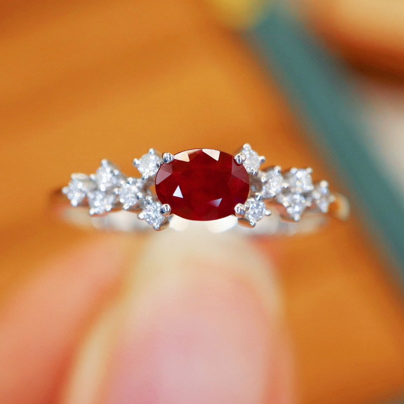 14k Gold 0.58 Ctw Natural Ruby & Diamond Ring: Ref:231088141 // gold content:14k gold // ring size:7. 25us // // main gemstone:ruby // shape:oval // carat weight:0. 46ct // color:red // treatment:natural // // adjacent gemstone 2 : diamond //