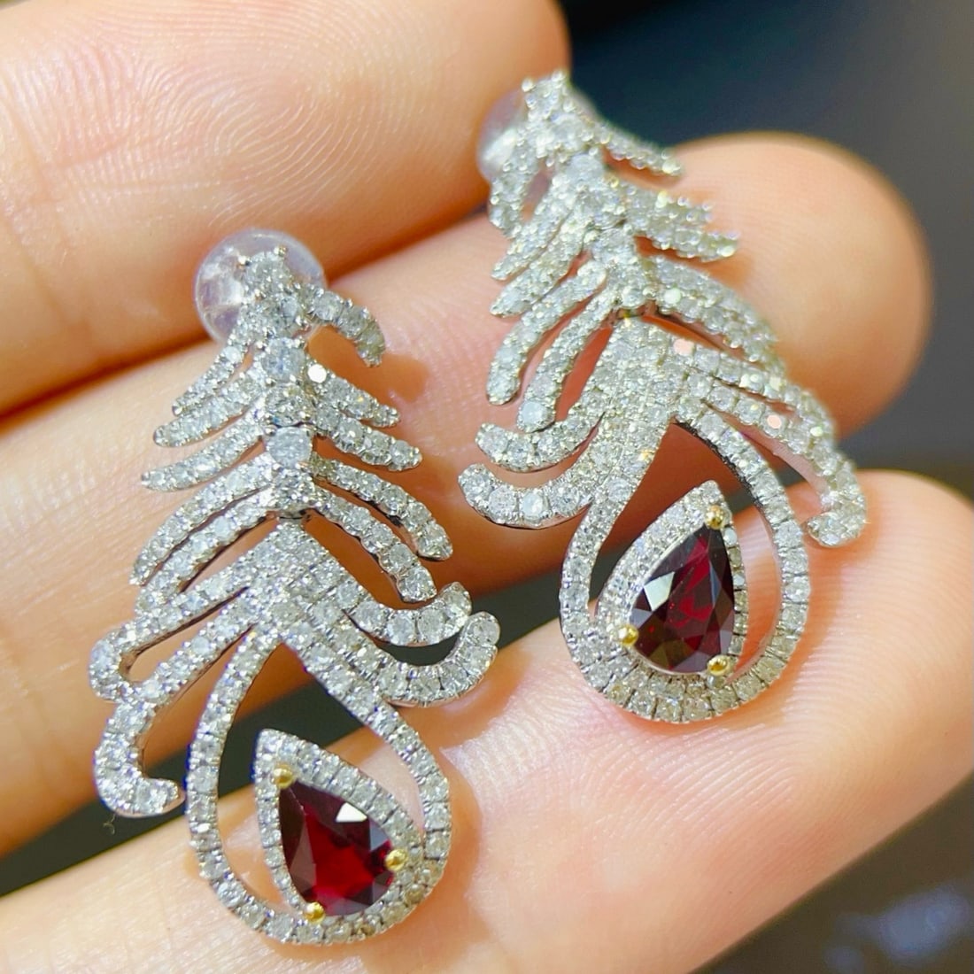 14k Gold 2.54 Ctw Natural Ruby & Diamond Earrings: Ref:231088164 // gold content:14k gold // main gemstone:ruby // shape:pear // carat weight:1. 10ct // color:red // treatment:natural // // adjacent gemstone 2 : diamond // shape:round // carat weight: