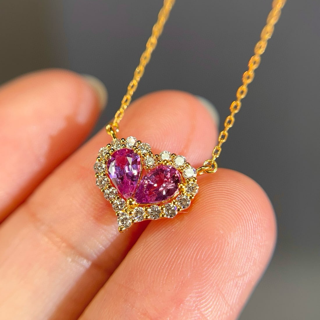 14k Gold 1.23 Ctw Natural Padparadscha Sapphire & Diamond Necklace: Ref:231088224 // gold content:14k gold // main gemstone:padparadscha sapphire // shape:pear // carat weight:0. 90ct // color:orangish pink // treatment:natural // // adjacent gemstone 2 : diamond
