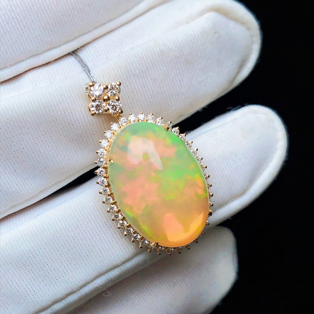14k Gold 7.48 Ctw Natural Opal & Diamond Pendant( Without Chain ): Ref:231088284 // gold content:14k gold // main gemstone:opal // shape:oval // carat weight:7. 0ct // color:color // treatment:natural // // adjacent gemstone 2 : diamond // shape:round // carat