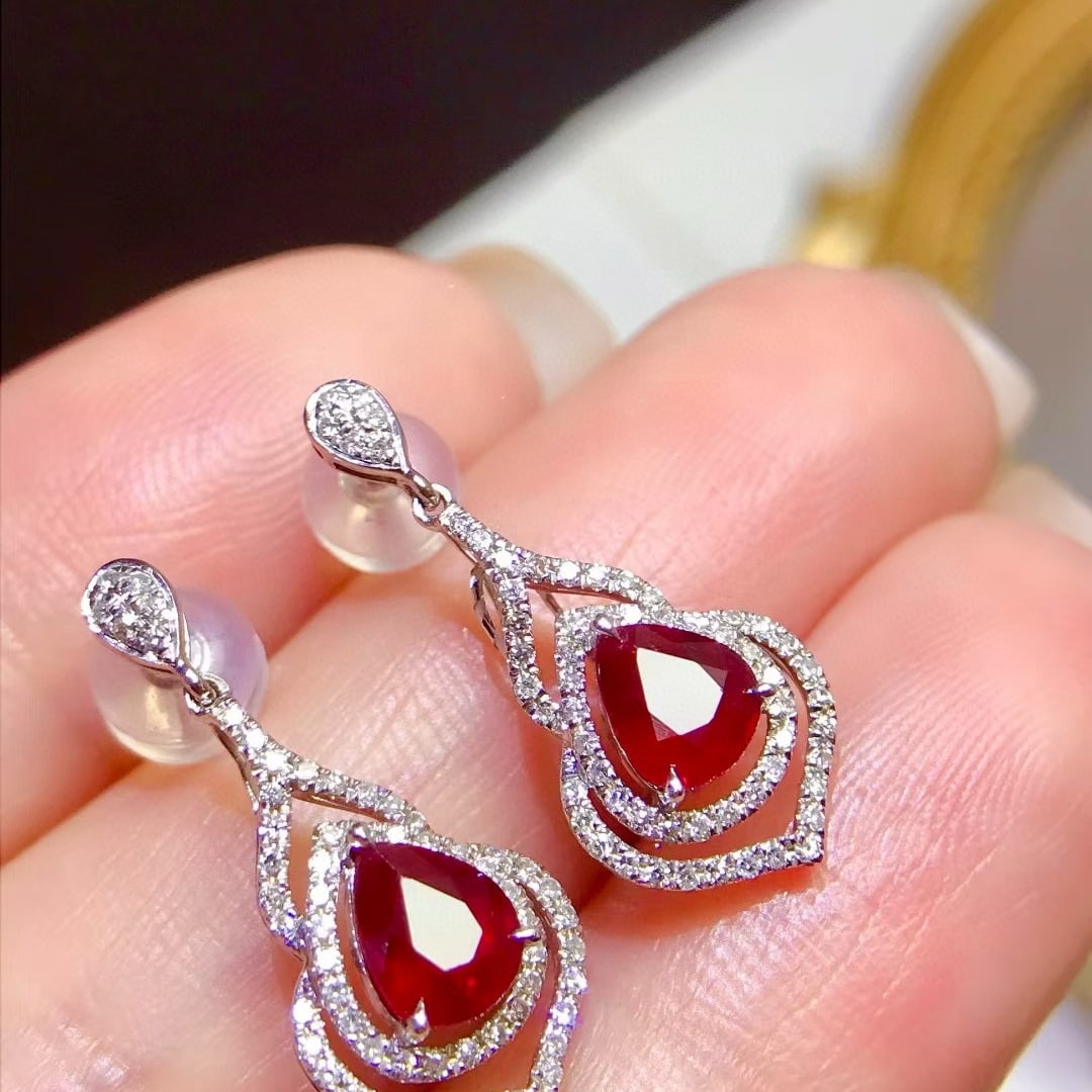 14k Gold 1.89 Ctw Natural Ruby & Diamond Earrings: Ref:231088396 // gold content:14k gold // main gemstone:ruby // shape:pear // carat weight:1. 4ct // color:pigeonblood red // treatment:natural // // adjacent gemstone 2 : diamond // shape:round //