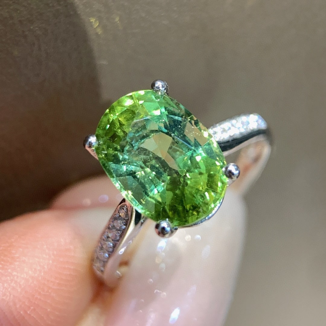 14k Gold 3.57 Ctw Natural Tourmaline & Diamond Ring: Ref:231089123 // gold content:14k gold // ring size:7. 25us // // main gemstone:tourmaline // shape:oval // carat weight:3. 47ct // color:green // treatment:natural // // adjacent gemstone 2 :