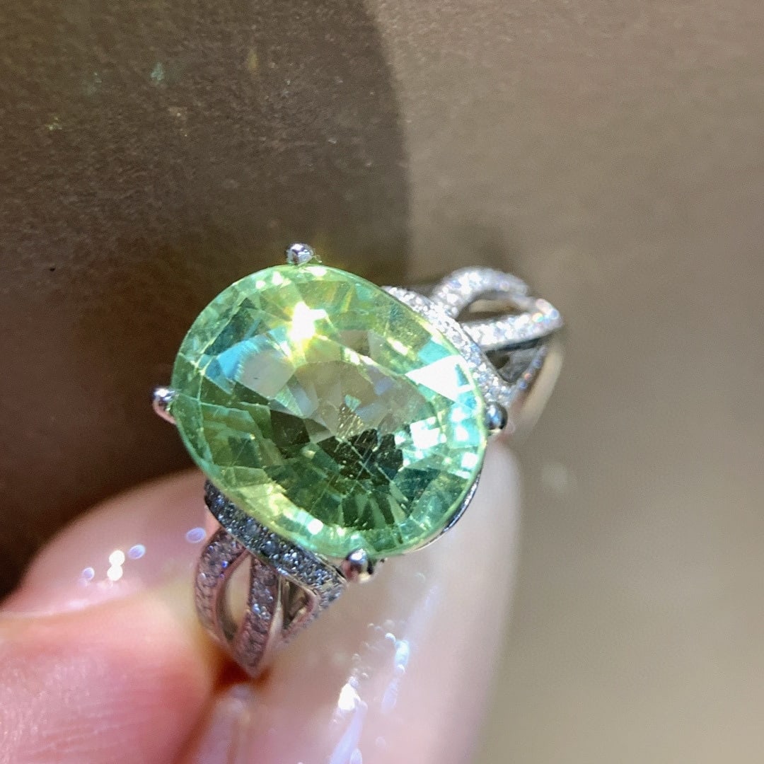 14k Gold 6.07 Ctw Natural Tourmaline & Diamond Ring: Ref:231089208 // gold content:14k gold // ring size:7. 25us // // main gemstone:tourmaline // shape:oval // carat weight:5. 86ct // color:green // treatment:natural // // adjacent gemstone 2 :