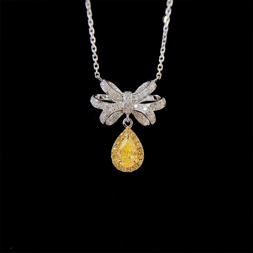 14k Gold 0.55 Ctw Natural Yellow Diamond & Diamond Necklace: Ref:231090016 // gold content:14k gold // main gemstone:yellow diamond // shape:pear // carat weight:0. 3ct // color:yellow // treatment:natural // // adjacent gemstone 2 : diamond // shape:round