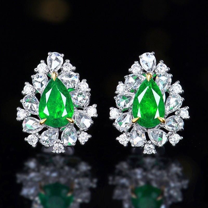 14k Gold 2.48 Ctw Vivid Green Natural Emerald & Diamond Earrings: Ref:231090025 // gold content:14k gold // main gemstone:emerald // shape:pear // carat weight:1. 38ct // color:vivid green // treatment:natural // // adjacent gemstone 2 : diamond // number of stones: