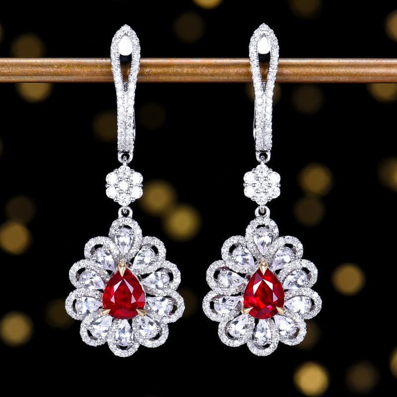 14k Gold 2.47 Ctw Natural Ruby & Diamond Earrings: Ref:231090026 // gold content:14k gold // main gemstone:ruby // shape:pear // carat weight:1. 59ct // color:pigeonblood red // treatment:natural // // adjacent gemstone 2 : diamond // number of stones