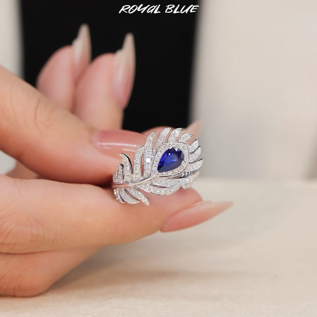 14k Gold 1.45 Ctw Natural Sapphire & Diamond Ring: Ref:231090037 // gold content:14k gold // ring size:7. 25us // // main gemstone:sapphire // shape:pear // carat weight:1. 06ct // color:royal blue // treatment:natural // // adjacent gemstone 2 :