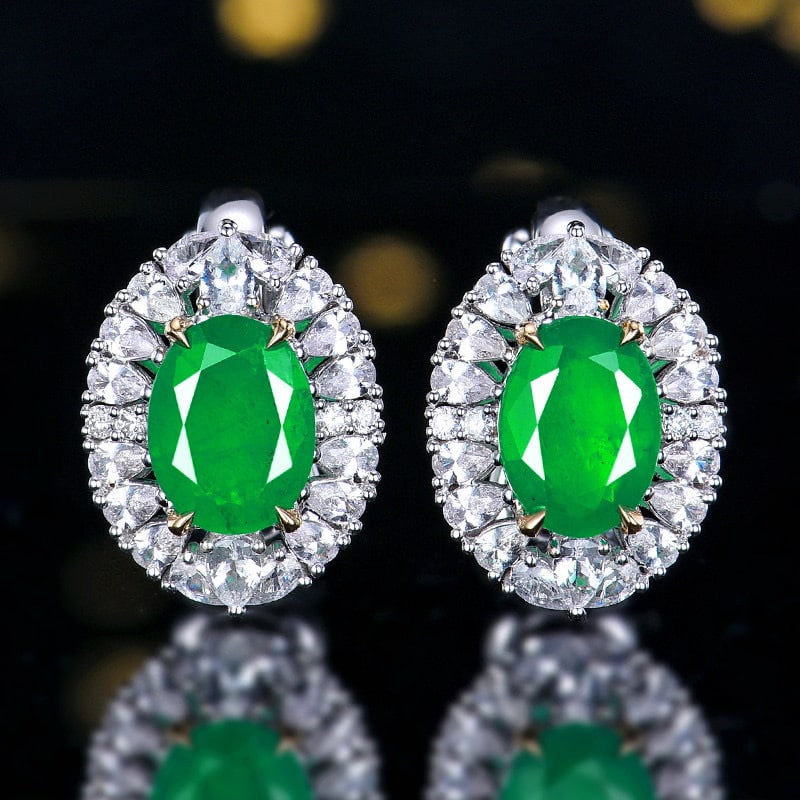 14k Gold 2.47 Ctw Vivid Green Natural Emerald & Diamond Earrings: Ref:231090044 // gold content:14k gold // main gemstone:emerald // shape:oval // carat weight:2. 4ct // color:vivid green // treatment:natural // // adjacent gemstone 2 : diamond // number of stones:8