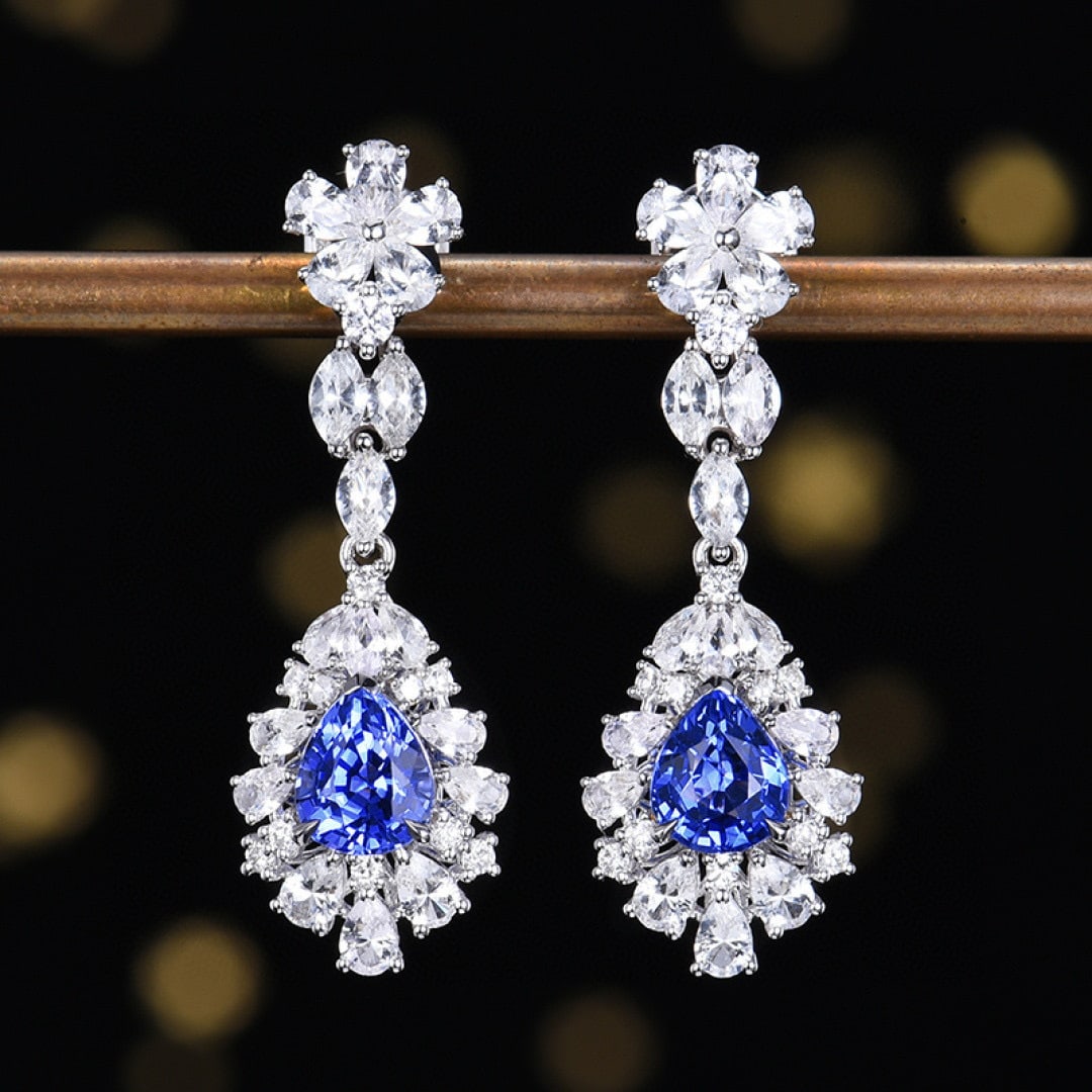 14k Gold 3.52 Ctw Natural Sapphire & Diamond Earrings: Ref:231090061 // gold content:14k gold // main gemstone:sapphire // shape:pear // carat weight:1. 58ct // color:blue // treatment:natural // // adjacent gemstone 2 : diamond // number of stones:20