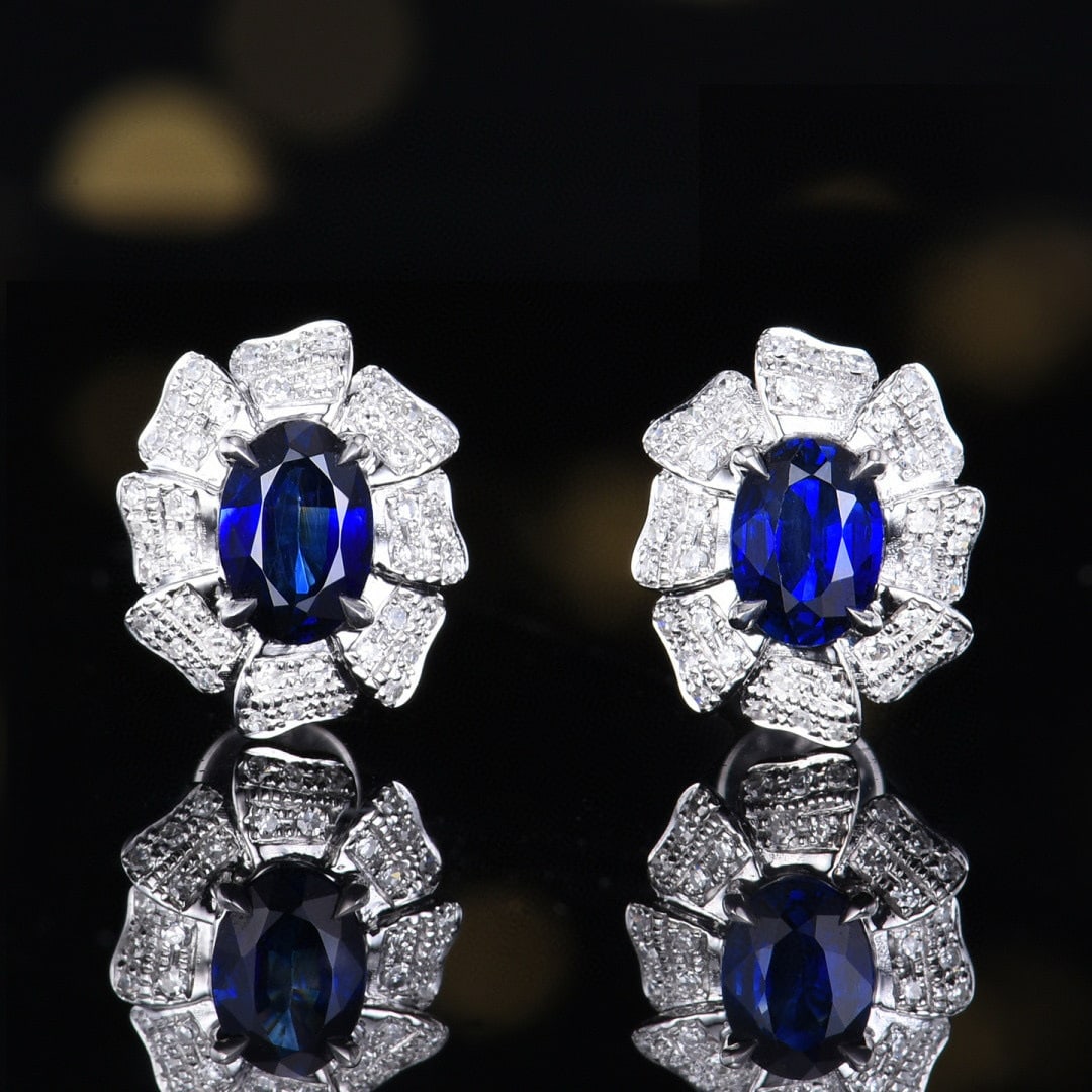 14k Gold 1.26 Ctw Natural Sapphire & Diamond Earrings: Ref:231090081 // gold content:14k gold // main gemstone:sapphire // shape:oval // carat weight:1. 06ct // color:blue // treatment:natural // // adjacent gemstone 2 : diamond // number of stones:80