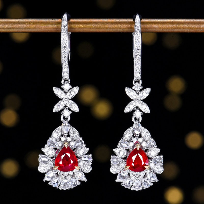 14k Gold 2.24 Ctw Natural Ruby & Diamond Earrings: Ref:231090082 // gold content:14k gold // main gemstone:ruby // shape:pear // carat weight:1. 26ct // color:pigeonblood red // treatment:natural // // adjacent gemstone 2 : diamond // number of