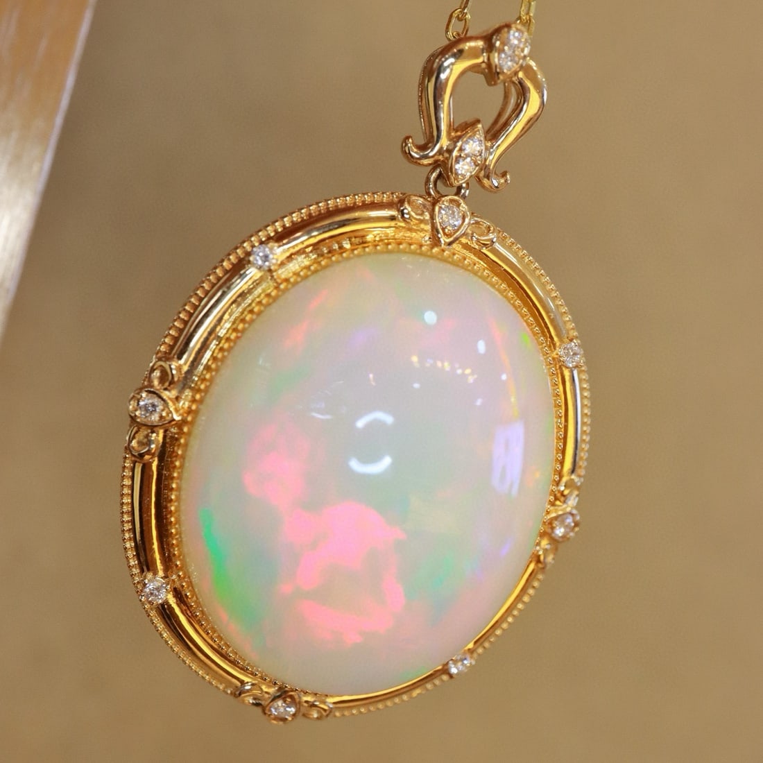 14k Gold 25.9 Ctw Natural Opal & Diamond Pendant( Without Chain ): Ref:231090131 // gold content:14k gold // main gemstone:opal // shape:oval // carat weight:25. 8ct // color:color // treatment:natural // // adjacent gemstone 2 : diamond // shape:round // carat