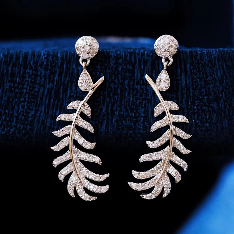 14k Gold 0.5 Ct Natural H Diamond Earrings: Ref:231090213 // gold content:14k gold // main gemstone:diamond // shape:round // carat weight:0. 5ct // clarity grade:vs-si // color:h // treatment:natural // cut grade:g // Condition: NewLow