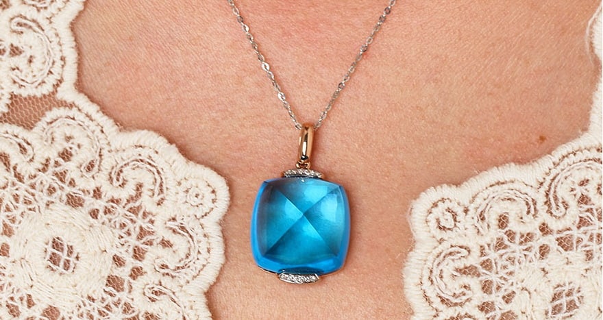 14k Gold 29.12 Ct Natural Topaz & Diamond Pendant( Without Chain ): Ref:231090253 // gold content:14k gold // main gemstone:topaz // shape:sugar-loaf // carat weight:29. 12ct // color:blue // treatment:natural // // adjacent gemstone 2 : diamond // shape:round //