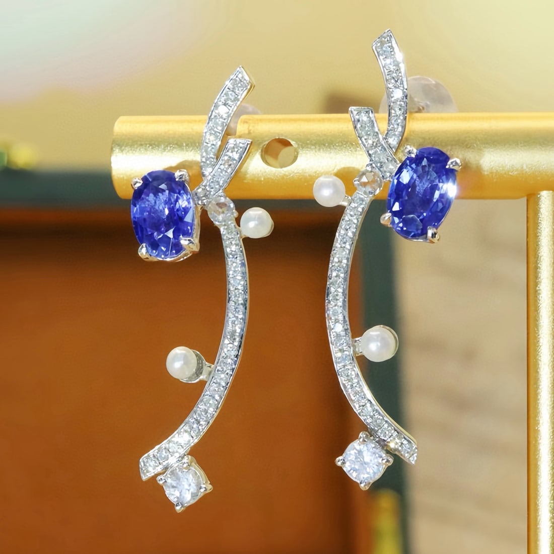 14k Gold 1.55 Ctw Natural Sapphire & Diamond Earrings: Ref:231090361 // gold content:14k gold // main gemstone:sapphire // shape:oval // carat weight:1. 32ct // color:blue // treatment:natural // // adjacent gemstone 2 : diamond // number of stones:66 //