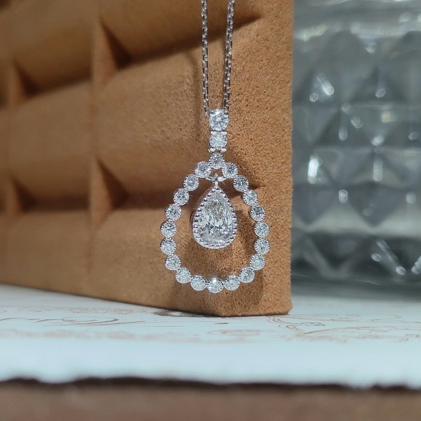 Gia Certified 14k Gold 0.57 Ctw Natural G Si1 Pear Diamond Necklace: Ref:231090392 // gold content:14k gold // main gemstone:diamond // certified:gia // shape:pear // carat weight:0. 3ct // clarity grade:si1 // color:g // treatment:natural // // adjacent gemstone 2