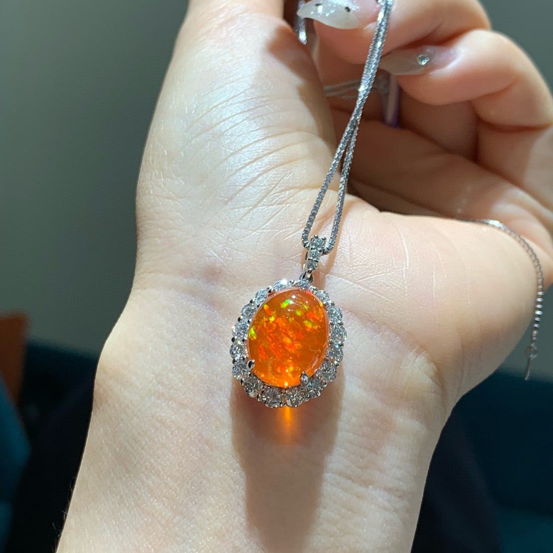 14k Gold 7.74 Ctw Natural Opal & Diamond Pendant( Without Chain ): Ref:231090449 // gold content:14k gold // main gemstone:opal // shape:oval // carat weight:6. 33ct // color:orange // treatment:natural // // adjacent gemstone 2 : diamond // shape:round // carat weig