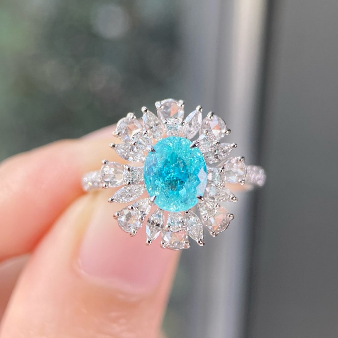 14k Gold 1.81 Ctw Natural Paraiba Tourmaline & Diamond Ring: Ref:230942003 // gold content:14k gold // ring size:7. 25us // // main gemstone:paraiba tourmaline // shape:oval // carat weight:1. 01ct // color:neon blue // treatment:natural // // adjacent gemstone