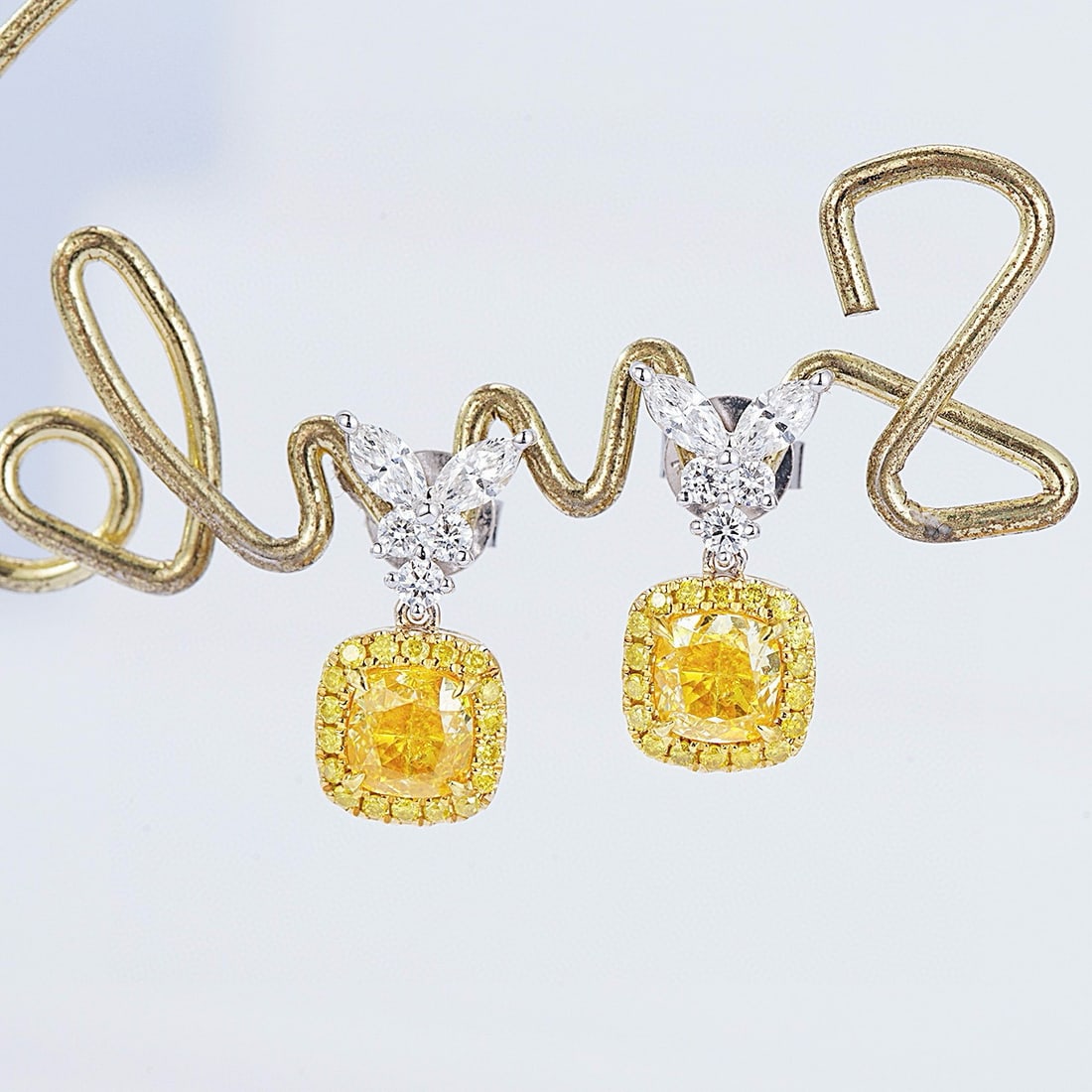 14k Gold 1.48 Ctw Natural Yellow Diamond & Diamond Earrings: Ref:230942019 // gold content:14k gold // main gemstone:yellow diamond // shape:cushion // carat weight:1. 02ct // color:yellow // treatment:natural // // adjacent gemstone 2 : diamond //