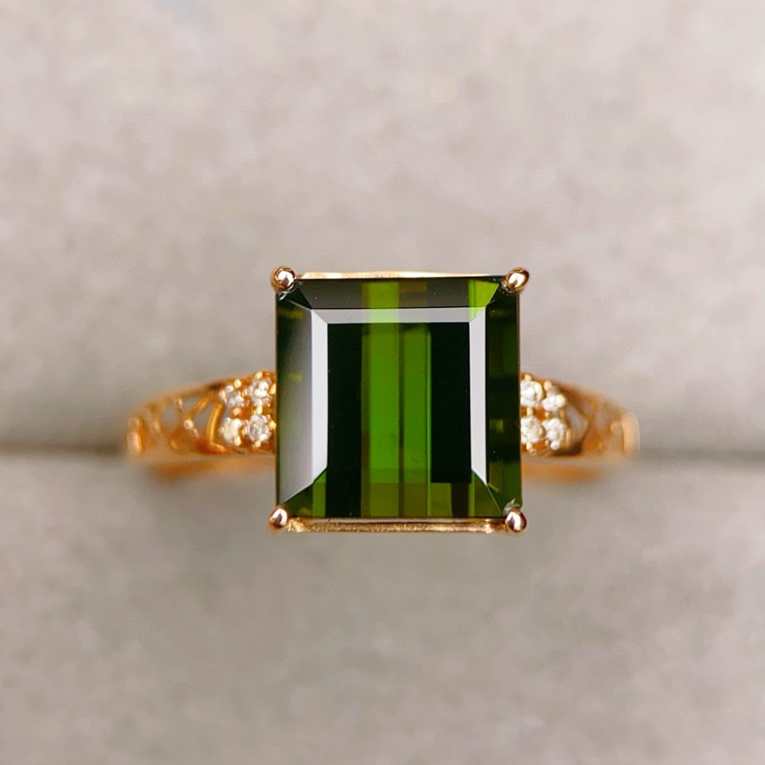 14k Gold 3.29 Ctw Natural Tourmaline & Diamond Ring: Ref:230942078 // gold content:14k gold // ring size:7. 25us // // main gemstone:tourmaline // shape:octagonal // carat weight:3. 25ct // color:green // treatment:natural // // adjacent gemstone 2 : di
