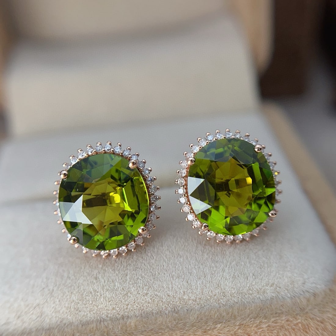 14k Gold 7.80 Ct Natural Tourmaline & Diamond Earrings: Ref:230942102 // gold content:14k gold // main gemstone:tourmaline // shape:oval // carat weight:7. 80ct // color:green // treatment:natural // // adjacent gemstone 2 : diamond // number of stones:68