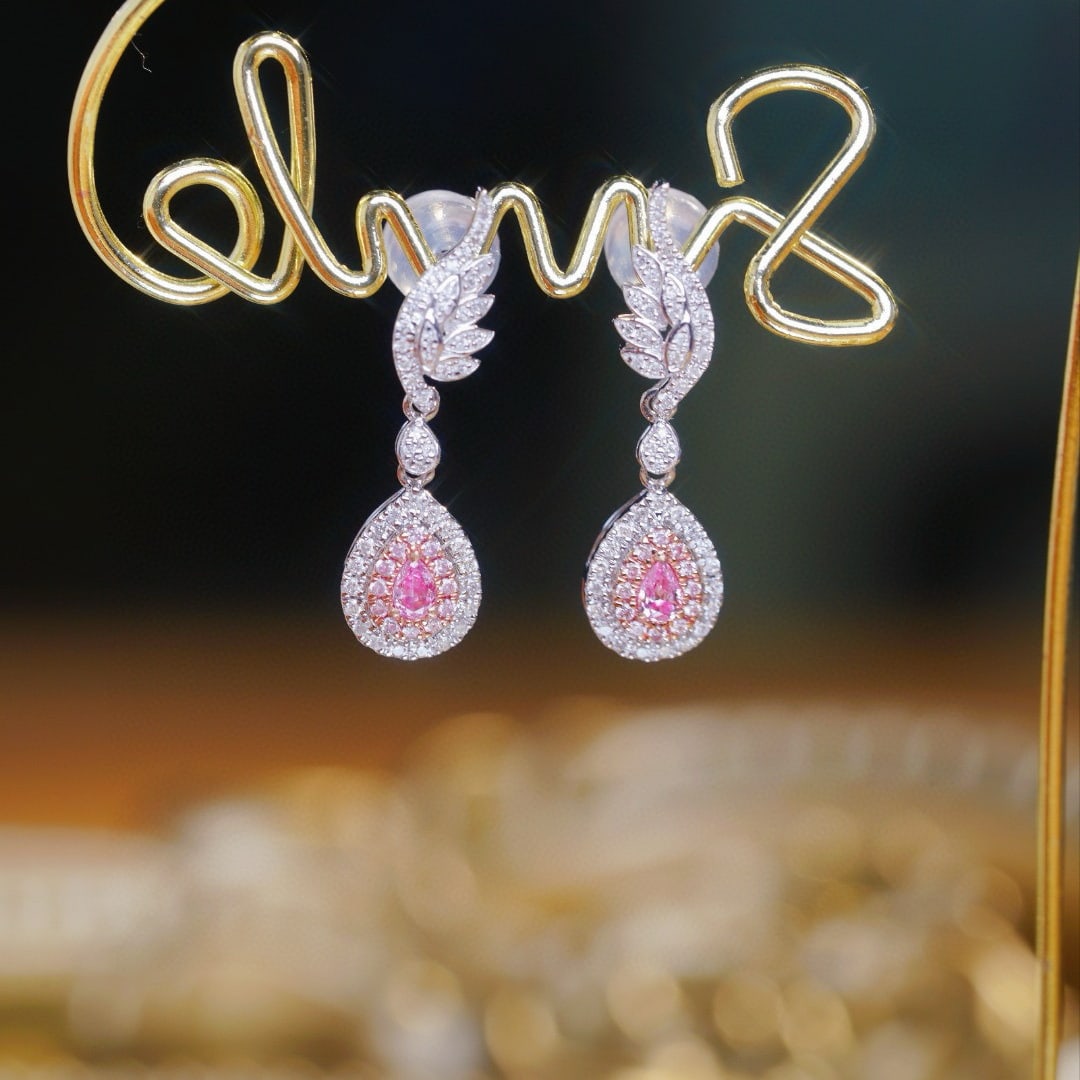 14k Gold 0.60 Ct Natural Color Diamond Earrings: Ref:230942120 // gold content:14k gold // main gemstone:diamond // shape:multiply // carat weight:0. 60ct // clarity grade:vs-si // color:color // treatment:natural // Condition: NewLow Estimate: