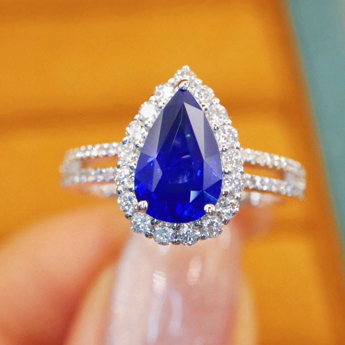 14k Gold 2.00 Ctw Natural Sapphire & Diamond Ring: Ref:230942148 // gold content:14k gold // ring size:7. 25us // // main gemstone:sapphire // shape:pear // carat weight:1. 55ct // color:royal blue // treatment:natural // // adjacent gemstone 2 :