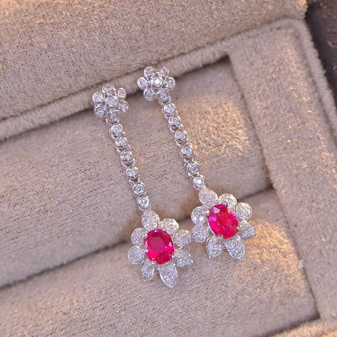 14k Gold 0.7 Ct Natural Ruby & Diamond Earrings: Ref:230942158 // gold content:14k gold // main gemstone:ruby // shape:oval // carat weight:0. 7ct // color:red // treatment:natural // // adjacent gemstone 2 : diamond // shape:round // clarity