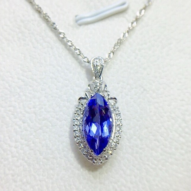 14k Gold 3.25 Ct Natural Tanzanite & Diamond Pendant( Without Chain ): Ref:230942183 // gold content:14k gold // main gemstone:tanzanite // shape:marquise // carat weight:3. 25ct // color:blue // treatment:natural // // adjacent gemstone 2 : diamond // number of stones:8