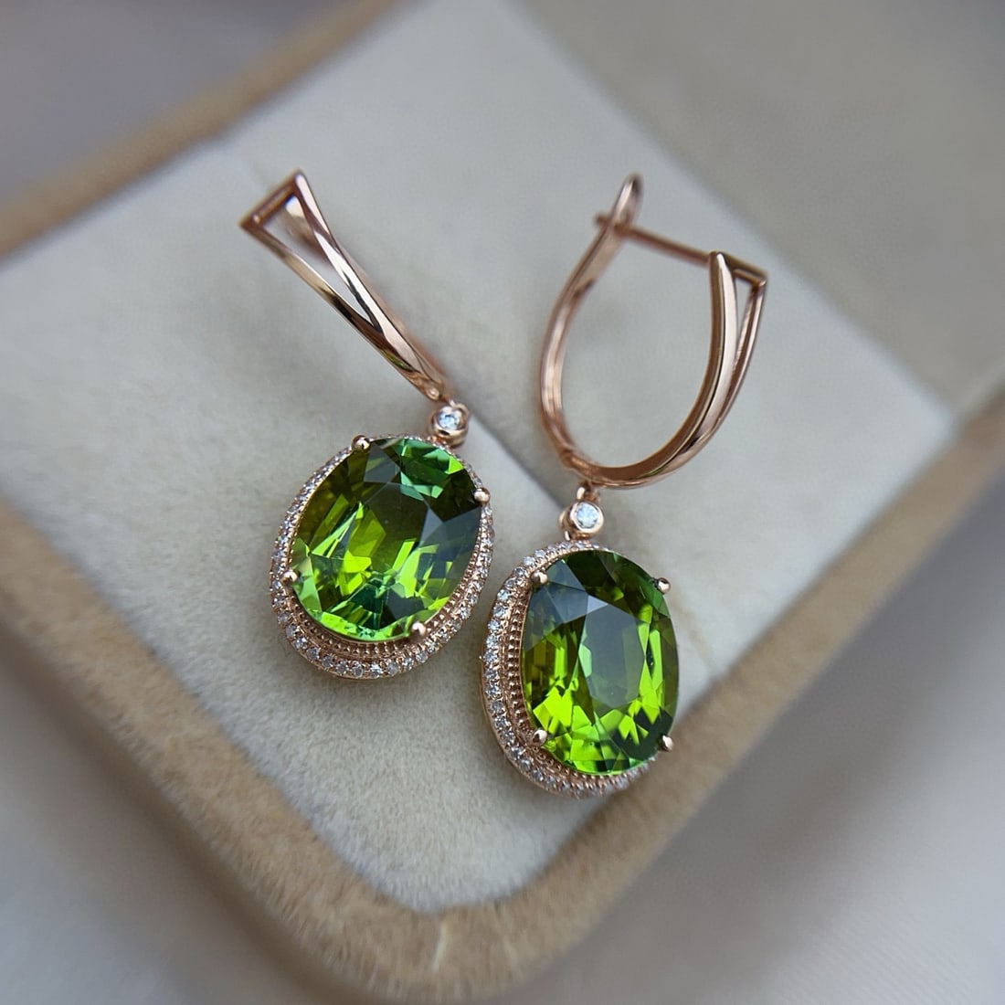 14k Gold 7.50 Ct Natural Tourmaline & Diamond Earrings: Ref:230942190 // gold content:14k gold // main gemstone:tourmaline // shape:oval // carat weight:7. 50ct // color:green // treatment:natural // // adjacent gemstone 2 : diamond // number of stones:92