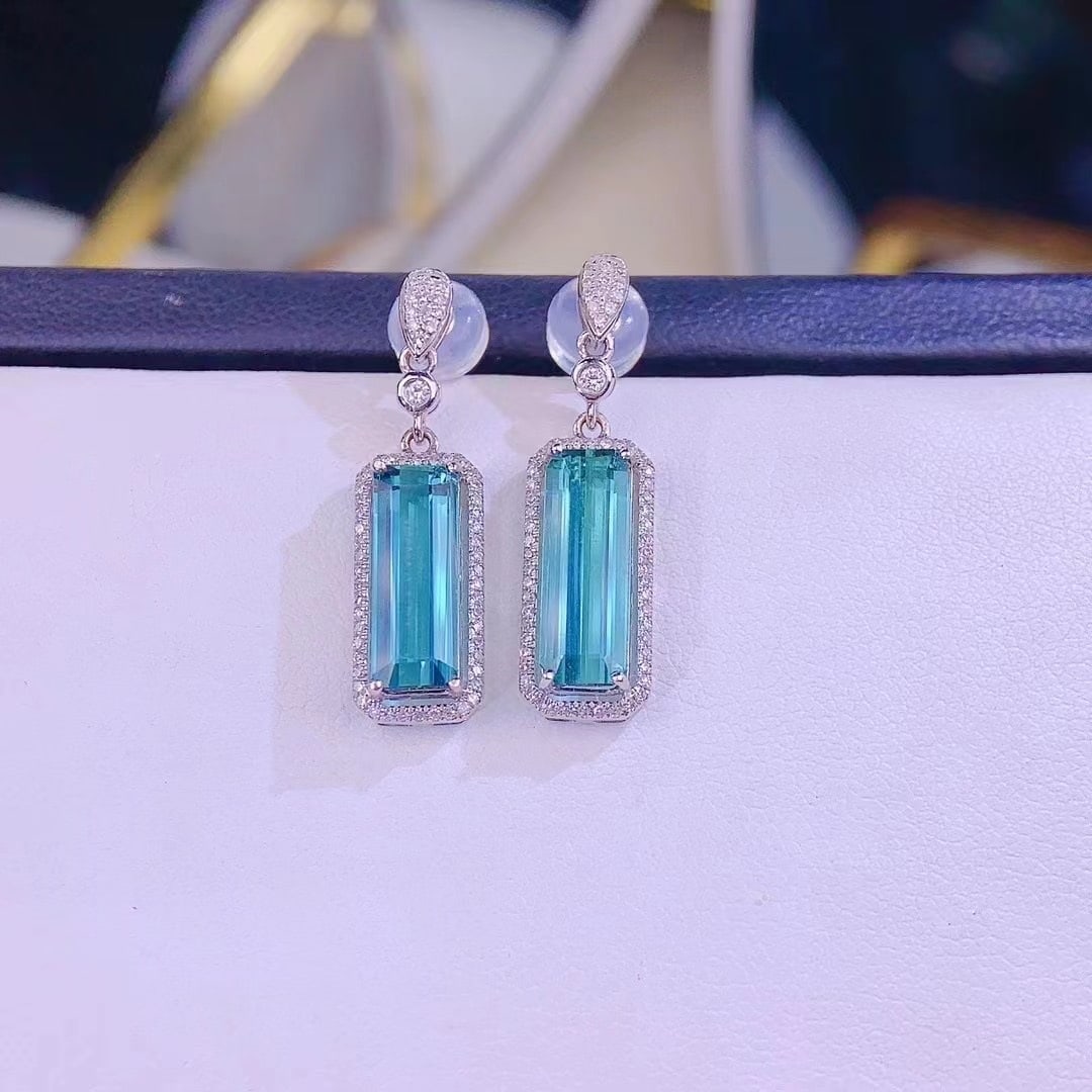 14k Gold 4.2 Ct Natural Tourmaline & Diamond Earrings: Ref:230942232 // gold content:14k gold // main gemstone:tourmaline // shape:octagonal // carat weight:4. 2ct // color:blue // treatment:natural // // adjacent gemstone 2 : diamond // shape:round // cl