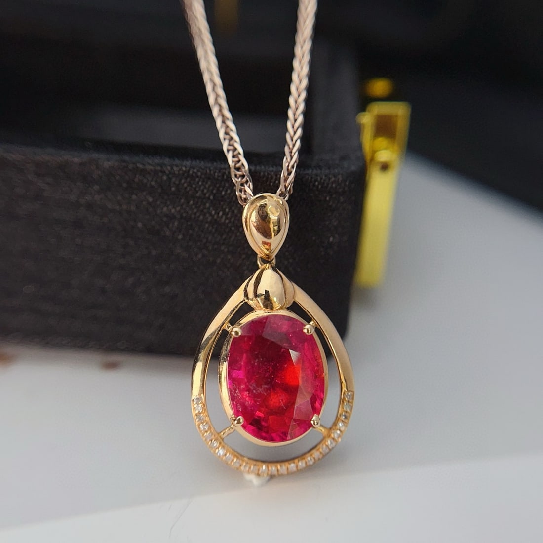 14k Gold 2.85 Ct Natural Tourmaline & Diamond Pendant( Without Chain ): Ref:230942279 // gold content:14k gold // main gemstone:tourmaline // shape:oval // carat weight:2. 85ct // color:red // treatment:natural // // adjacent gemstone 2 : diamond // number of stones:25