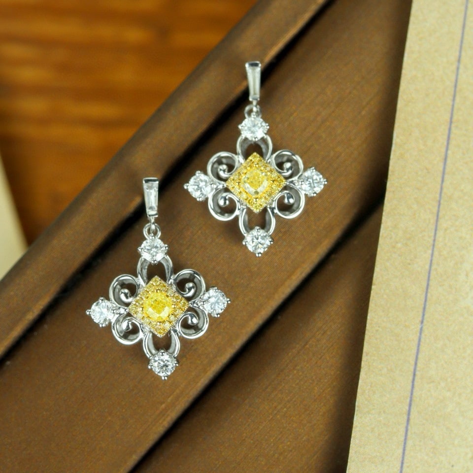 14k Gold 0.87 Ctw Natural Yellow Diamond & Diamond Earrings: Ref:230942339 // gold content:14k gold // main gemstone:yellow diamond // shape:cushion // carat weight:0. 22ct // color:yellow // treatment:natural // // adjacent gemstone 2 : diamond //