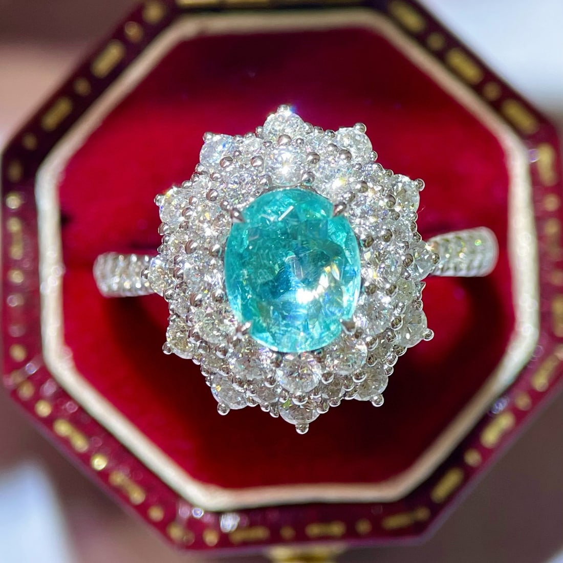 14k Gold 2.07 Ctw Natural Paraiba Tourmaline & Diamond Ring: Ref:230942349 // gold content:14k gold // ring size:7. 25us // // main gemstone:paraiba tourmaline // shape:oval // carat weight:0. 98ct // color:neon blue // treatment:natural // // adjacent gemstone