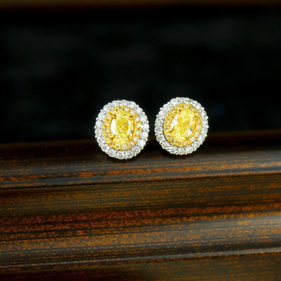 14k Gold 0.71 Ctw Natural Yellow Diamond & Diamond Earrings: Ref:230942375 // gold content:14k gold // main gemstone:yellow diamond // shape:oval // carat weight:0. 45ct // color:yellow // treatment:natural // // adjacent gemstone 2 : diamond // shape:round //