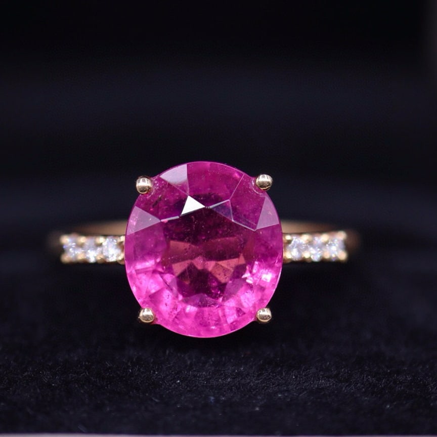 14k Gold 3.14 Ct Natural Tourmaline & Diamond Ring: Ref:230942400 // gold content:14k gold // ring size:7. 25us // // main gemstone:tourmaline // shape:oval // carat weight:3. 14ct // color:red // treatment:natural // // adjacent gemstone 2 : diamond /