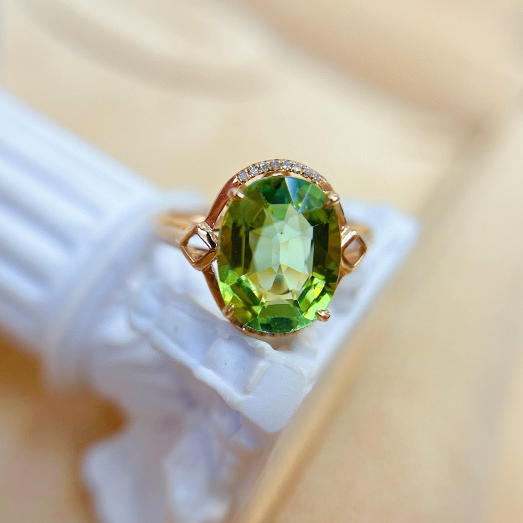 14k Gold 3.05 Ct Natural Tourmaline & Diamond Ring: Ref:230942406 // gold content:14k gold // ring size:7. 25us // // main gemstone:tourmaline // shape:oval // carat weight:3. 05ct // color:green // treatment:natural // // adjacent gemstone 2 :