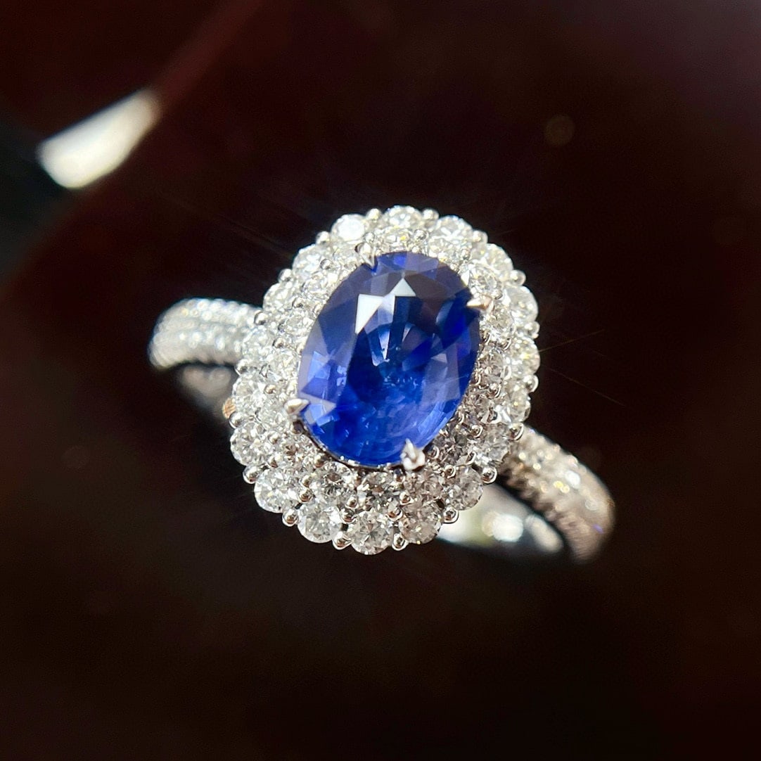14k Gold 2.33 Ctw Vivid Blue Natural Sapphire & Diamond Ring: Ref:230942418 // gold content:14k gold // ring size:7. 25us // // main gemstone:sapphire // shape:oval // carat weight:1. 60ct // color:vivid blue // treatment:natural // // adjacent gemstone 2 :