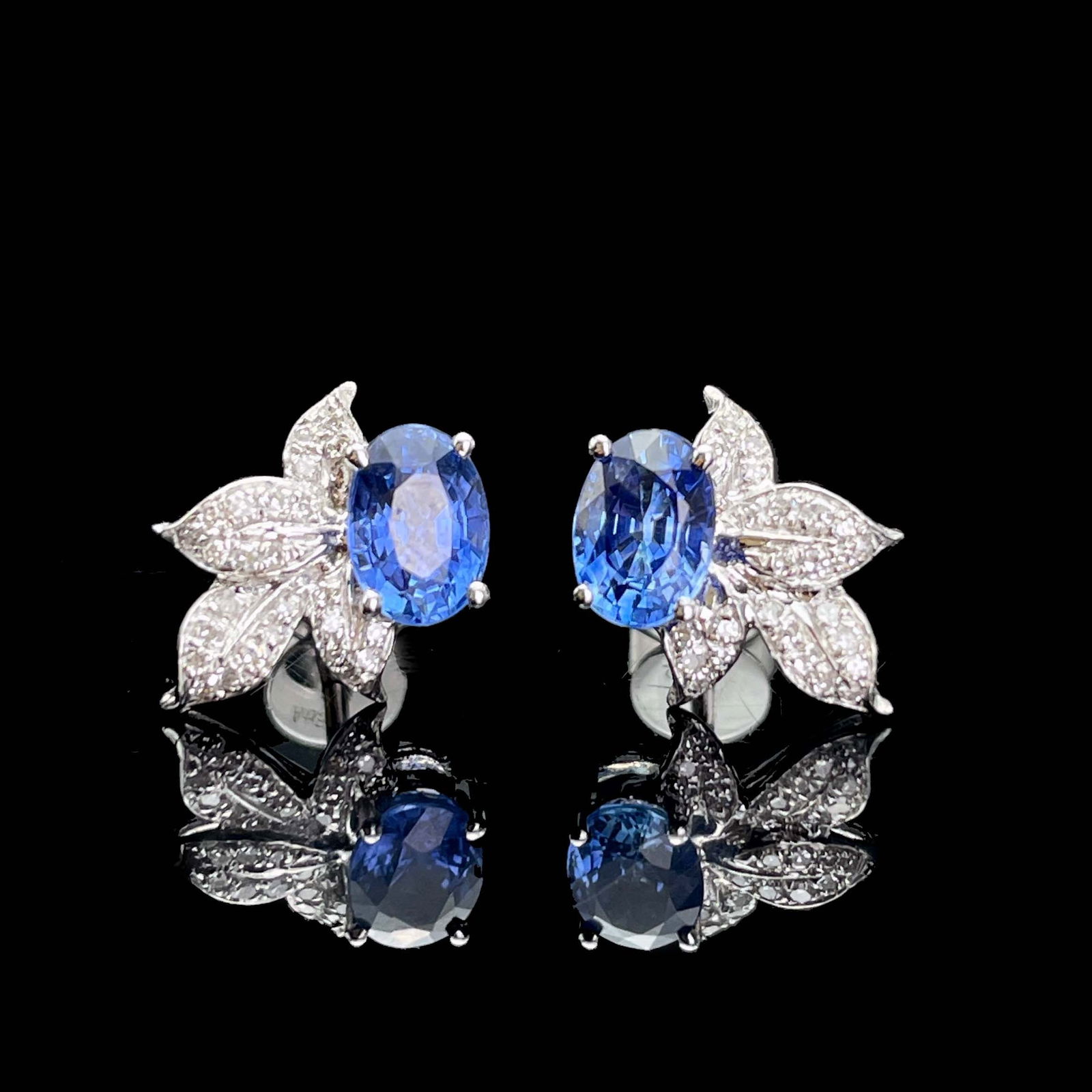 14k Gold 1.35 Ctw Natural Sapphire & Diamond Earrings: Ref:230943366 // gold content:14k gold // main gemstone:sapphire // shape:oval // carat weight:1. 20ct // color:blue // treatment:natural // // adjacent gemstone 2 : diamond // shape:round // carat