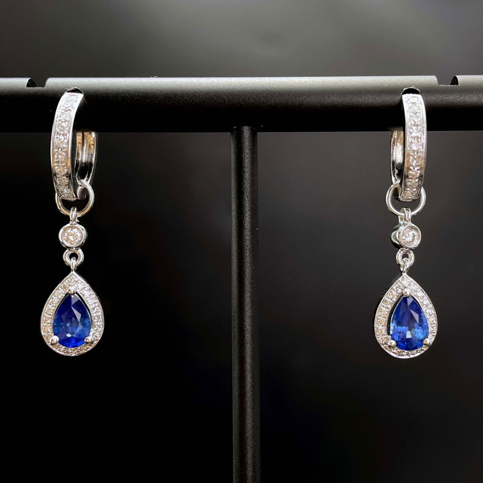 14k Gold 1.18 Ctw Natural Sapphire & Diamond Earrings: Ref:230943486 // gold content:14k gold // main gemstone:sapphire // shape:pear // carat weight:0. 94ct // color:blue // treatment:natural // // adjacent gemstone 2 : diamond // shape:round // carat