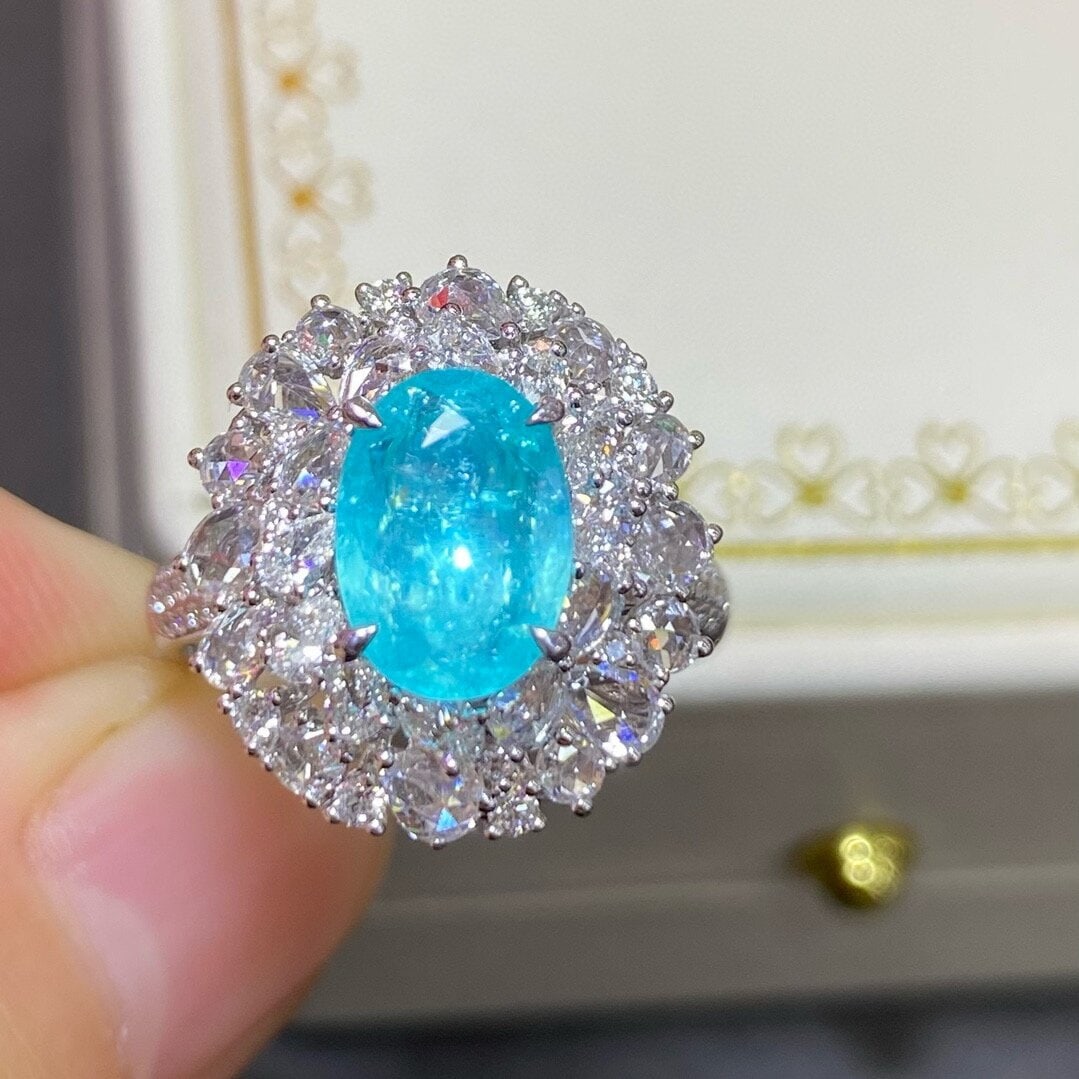 14k Gold 3.02 Ctw Natural Paraiba Tourmaline & Diamond Ring/pendant( Without Chain ): Ref:230944015 // gold content:14k gold // ring size:7. 25us // // main gemstone:paraiba tourmaline // shape:oval // carat weight:1. 57ct // color:blue // treatment:natural // // adjacent gemstone 2 :