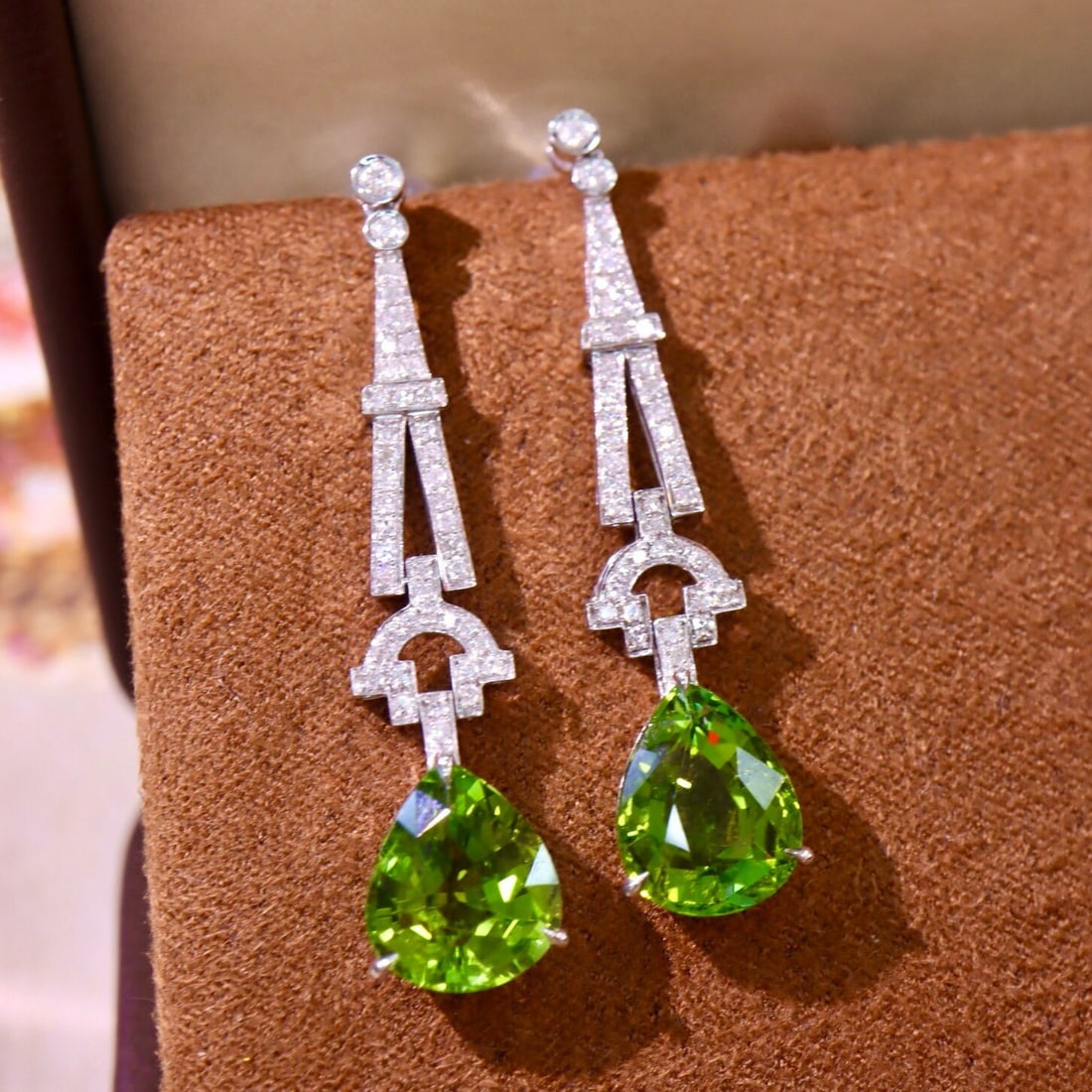 14k Gold 6.19 Ctw Natural Tourmaline & Diamond Earrings: Ref:230944082 // gold content:14k gold // main gemstone:tourmaline // shape:pear // carat weight:5. 90ct // color:green // treatment:natural // // adjacent gemstone 2 : diamond // shape:round // carat