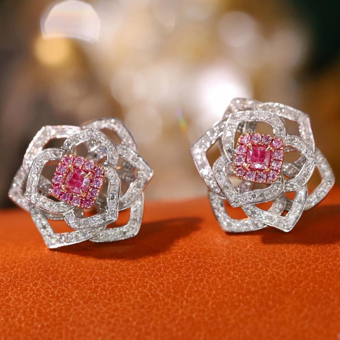 14k Gold 0.80 Ctw Natural Pink Diamond & Diamond Earrings: Ref:230944102 // gold content:14k gold // main gemstone:pink diamond // shape:cushion // carat weight:0. 22ct // color:pink // treatment:natural // // adjacent gemstone 2 : diamond // shape:round // c