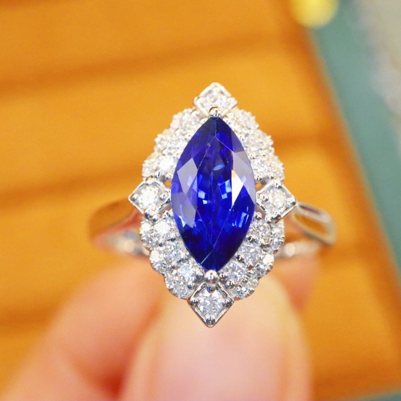 14k Gold 1.75 Ctw Natural Sapphire & Diamond Ring: Ref:230944150 // gold content:14k gold // ring size:7. 25us // // main gemstone:sapphire // shape:marquise // carat weight:1. 46ct // color:royal blue // treatment:natural // // adjacent gemstone