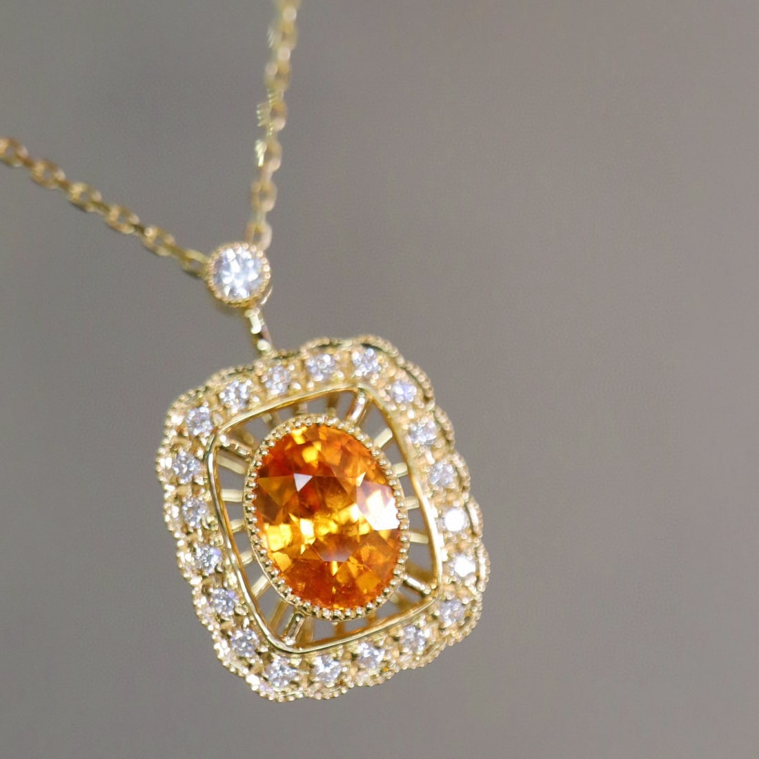 14k Gold 1.93 Ctw Natural Spessartine & Diamond Necklace: Ref:230944160 // gold content:14k gold // main gemstone:spessartine // shape:oval // carat weight:1. 72ct // color:orange // treatment:natural // // adjacent gemstone 2 : diamond // shape:round //