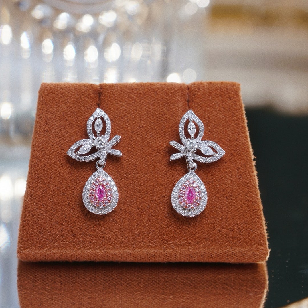 14k Gold 0.90 Ct Natural Color Diamond Earrings: Ref:230944168 // gold content:14k gold // main gemstone:diamond // shape:multiply // carat weight:0. 90ct // clarity grade:vs-si // color:color // treatment:natural // Condition: NewLow Estimate: