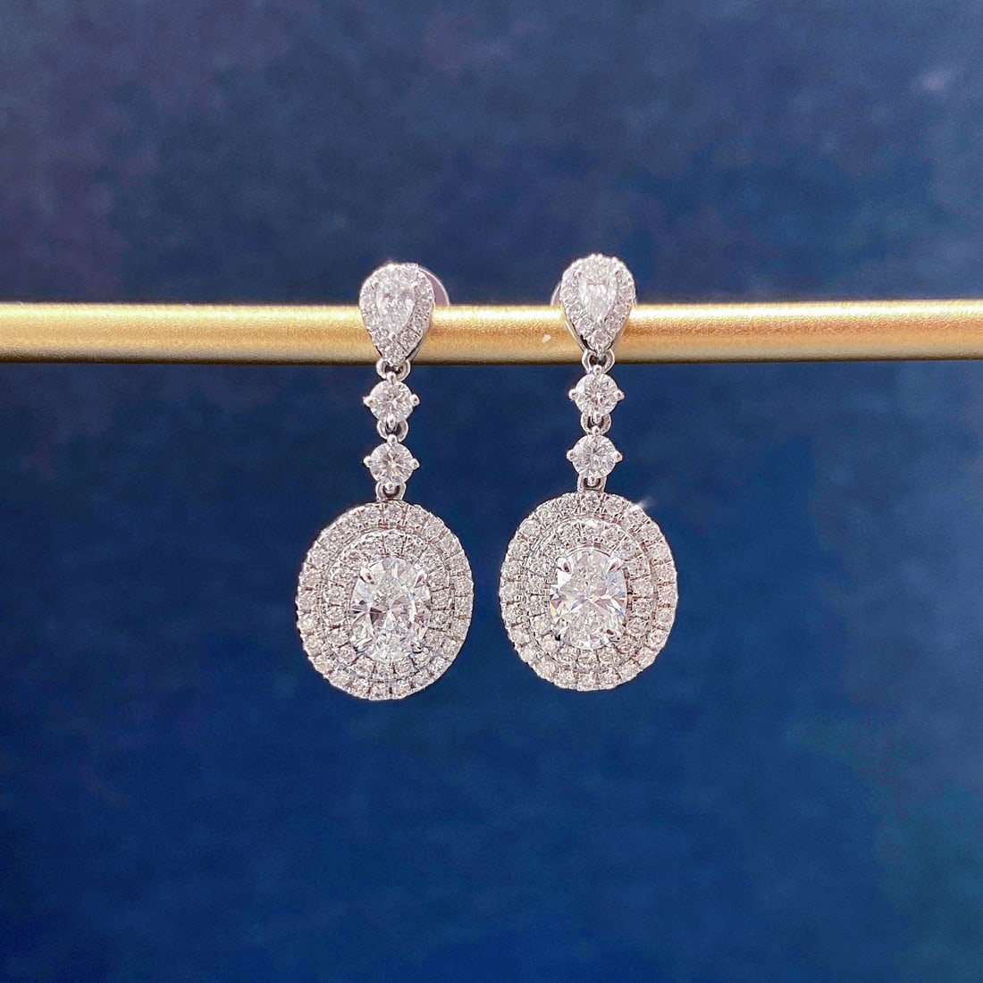 Gia Certified 14k Gold 1.14 Ctw Natural E Si1 Oval Diamond Earrings: Ref:230944208 // gold content:14k gold // main gemstone:diamond // certified:gia // shape:oval // carat weight:0. 61ct // clarity grade:si1 // color:e // treatment:natural // // adjacent gemstone 2