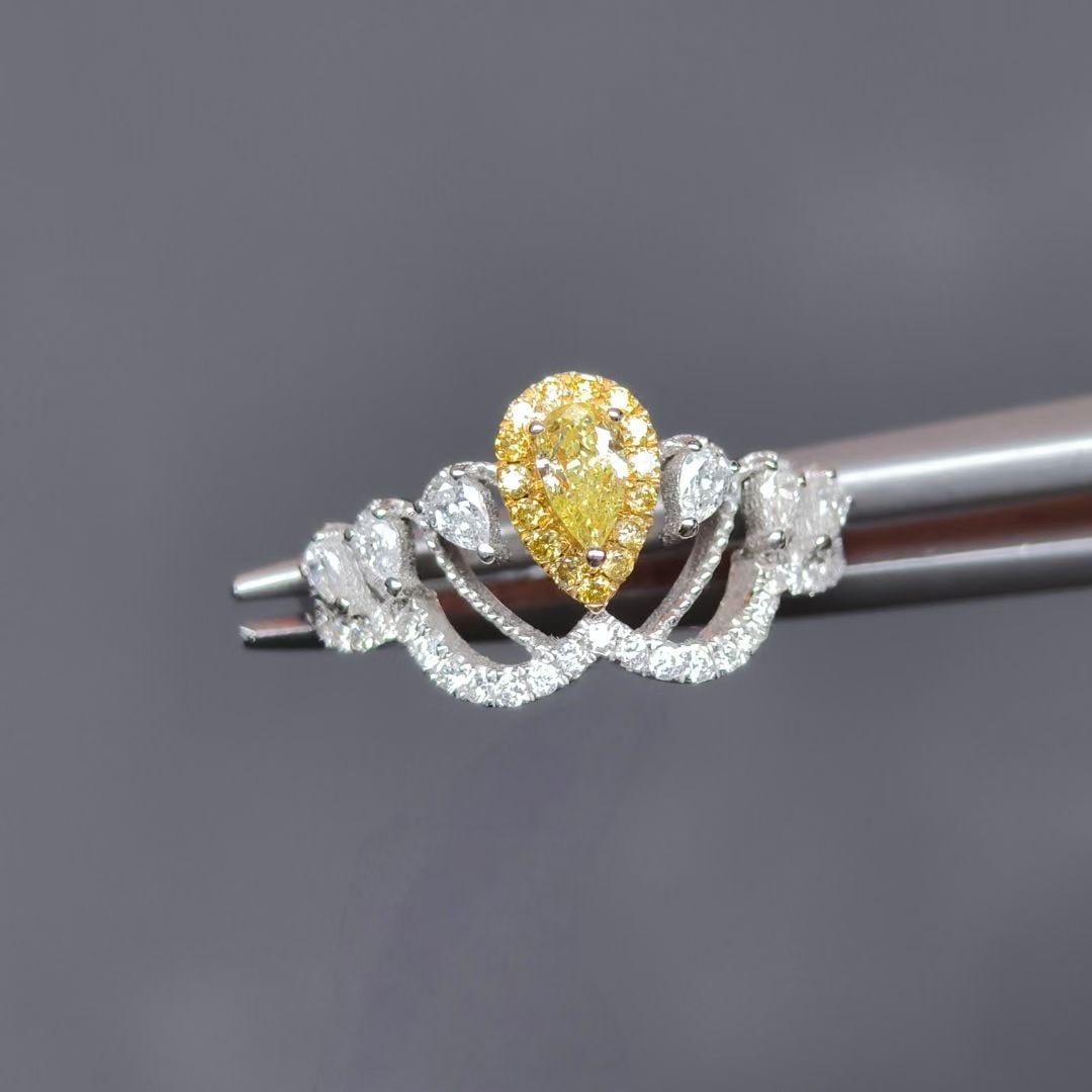 14k Gold 0.56 Ctw Natural Yellow Diamond & Diamond Ring: Ref:230944225 // gold content:14k gold // ring size:7. 25us // // main gemstone:yellow diamond // shape:pear // carat weight:0. 21ct // color:yellow // treatment:natural // // adjacent gemstone 2